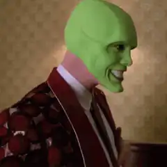 The Mask shushing and smiling