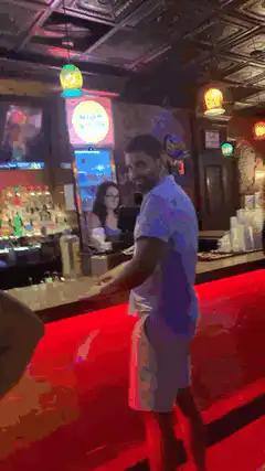 Man dancing at a bar