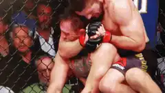 MMA fighter gets stopped by referee