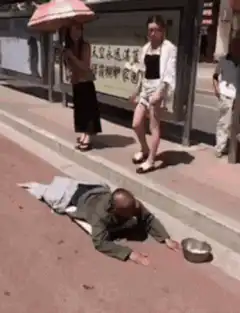 Man crawling to beg for money