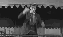 Charlie Chaplin shrugging