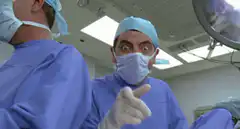 Dr. Bean points and smiles