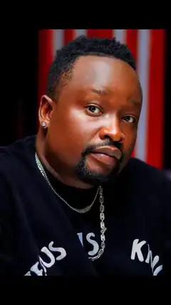 Bishop Oluwaseun looking at camera