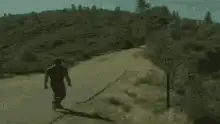Man walking on a road