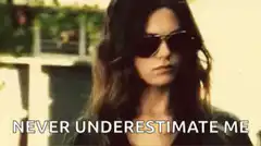Woman removes sunglasses never underestimate me