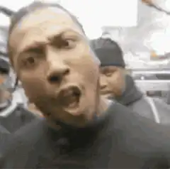 Man screaming and headbanging