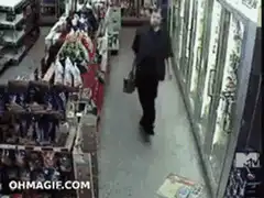 Man slips on wet floor in store