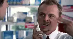 Simon Pegg sweating on phone