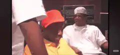 Chris Tucker and Jay-Z nodding in studio