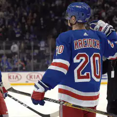 Kreider and Panarin celebrate on ice