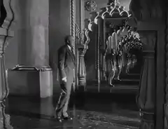 Man walking into infinite mirrors