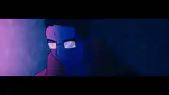 Man with glasses in blue and purple light
