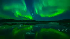 Aurora Borealis over icy water