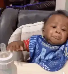 Baby crying and facepalming