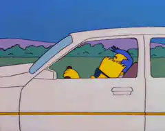 Bart Simpson asleep in car
