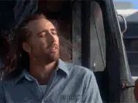 Nicolas Cage smiling in Hairspray