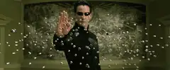 Neo stops bullets with his hand