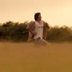 Man running through a field