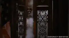 President Jackson Evans enters through smoke