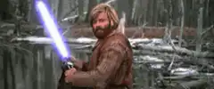 Luke Skywalker ignites lightsaber and smiles