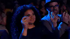 Woman and man dancing in audience