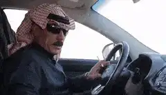 Arab man smoking in car