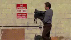 Man throws briefcase into dumpster