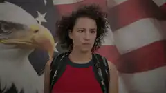 Girl salutes with intense expression