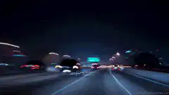night highway drive with light trails