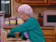 Grandma slaps herself with a hairbrush