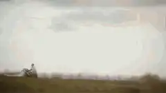 Person riding a giant shoe