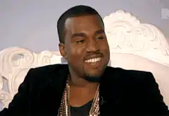 Kanye West smiling then serious