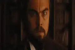 DiCaprio shocked and clutching chest