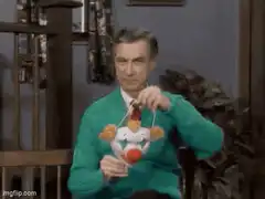 Mr. Rogers puts on a clown mask