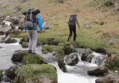 hiker slips and falls into stream