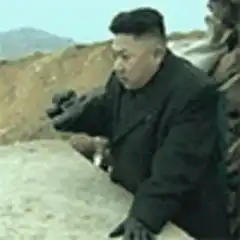 Kim Jong Un looking through binoculars