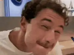 Man winking with mustache