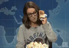 Tina Fey eating cake messily