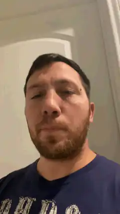 man blinking slowly