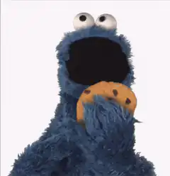 Cookie Monster eats a cookie