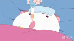 Hamster getting medicine from dropper