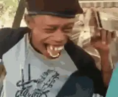 Man with large teeth laughing hysterically