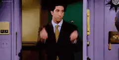 Ross Geller dancing in the doorway