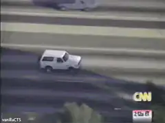 White SUV driving on highway