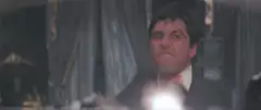 Tony Montana smoking cigar