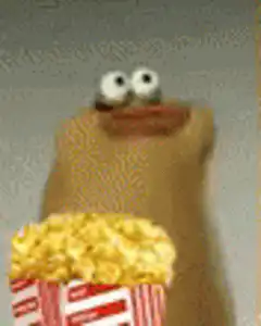 Cookie Monster eating popcorn
