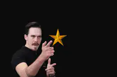 Man conjuring golden stars