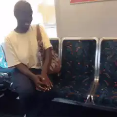 Woman laughing on train