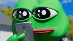 Pepe Frog looking at phone then laughing