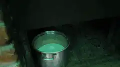 pot boiling over fireplace